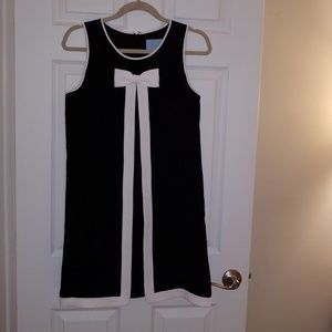 Sleeveless black and white bow dress